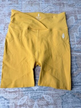 Free People Movement Blaze Biker Short (tumeric/mustard yellow)